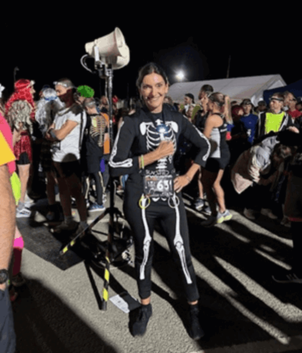 Debra in a skeleton outfit