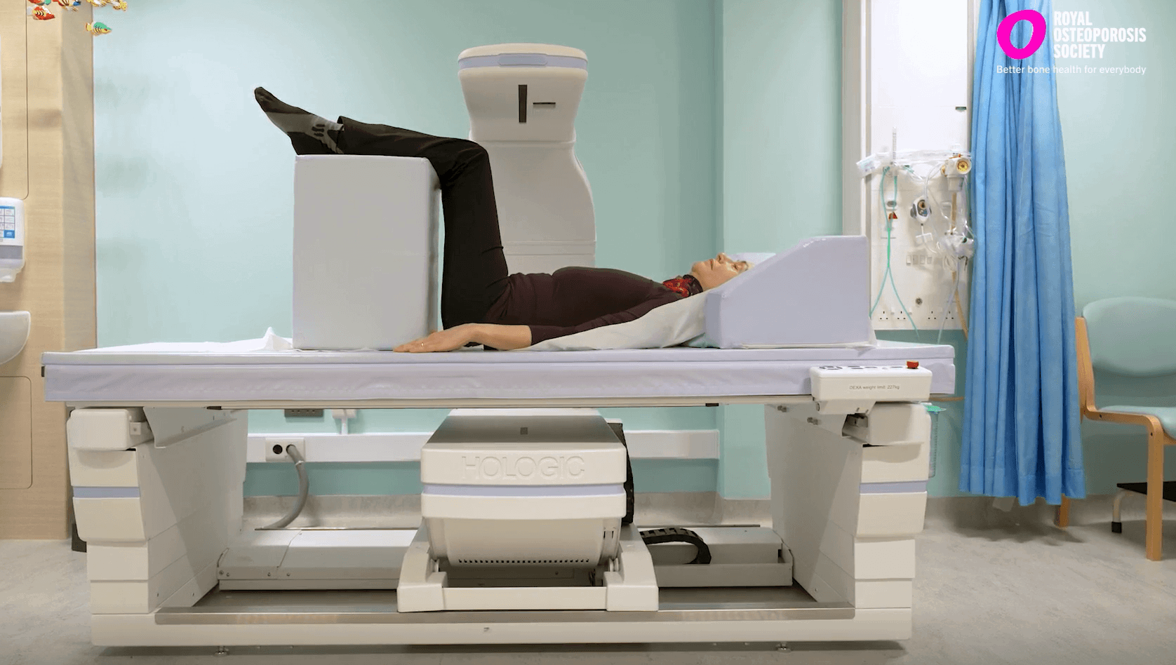 Woman having a bone density scan