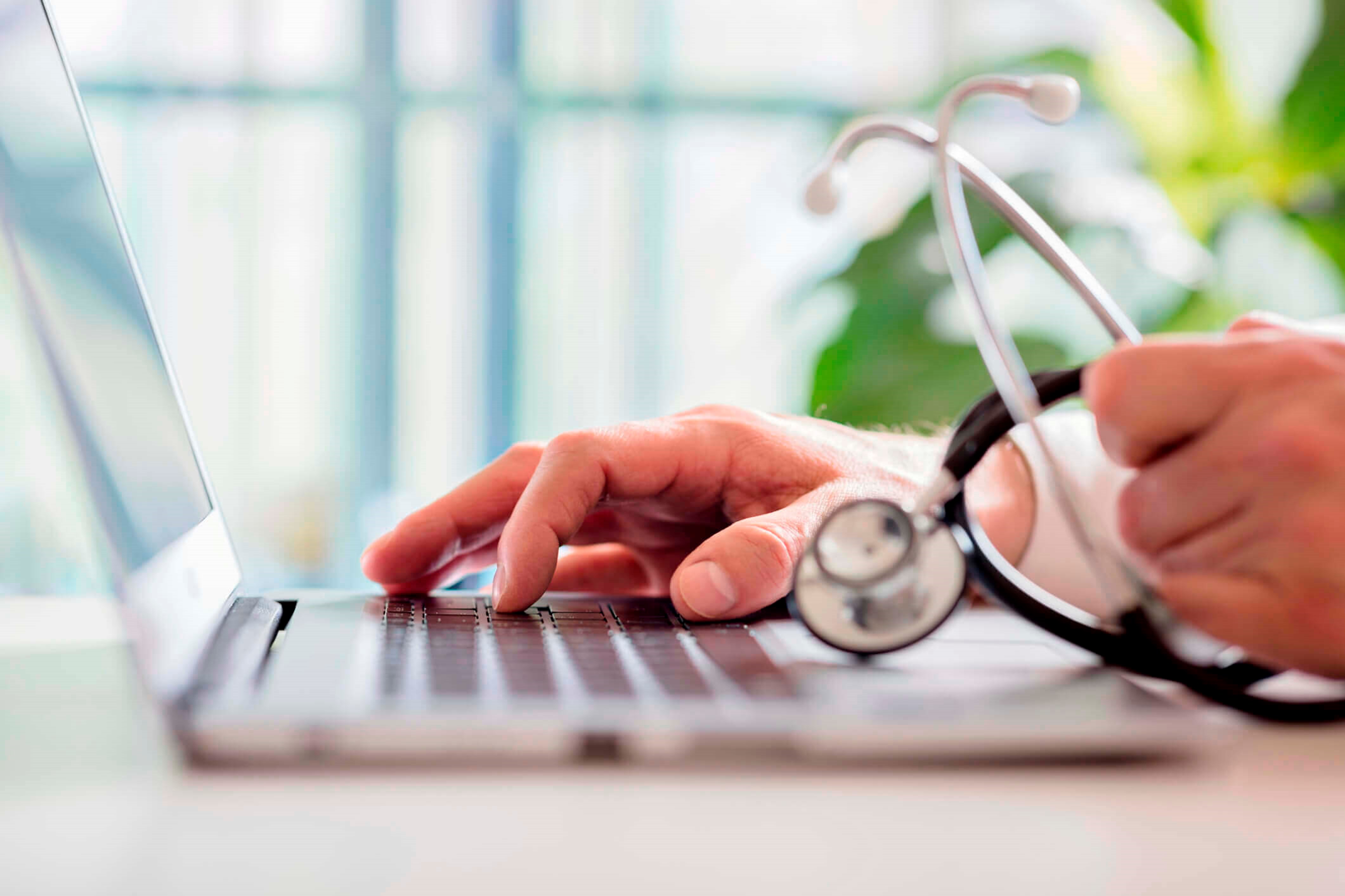 Doctor At Laptop