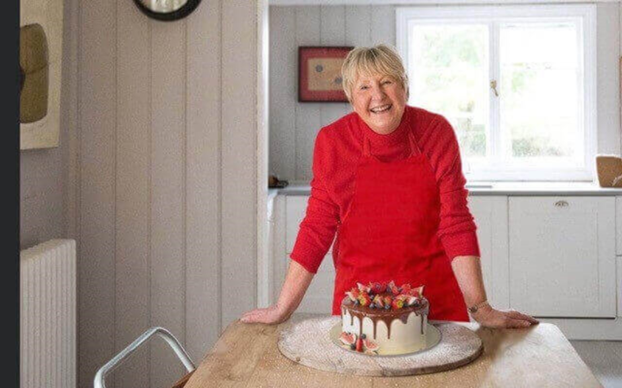 Val and one of her delicious cakes