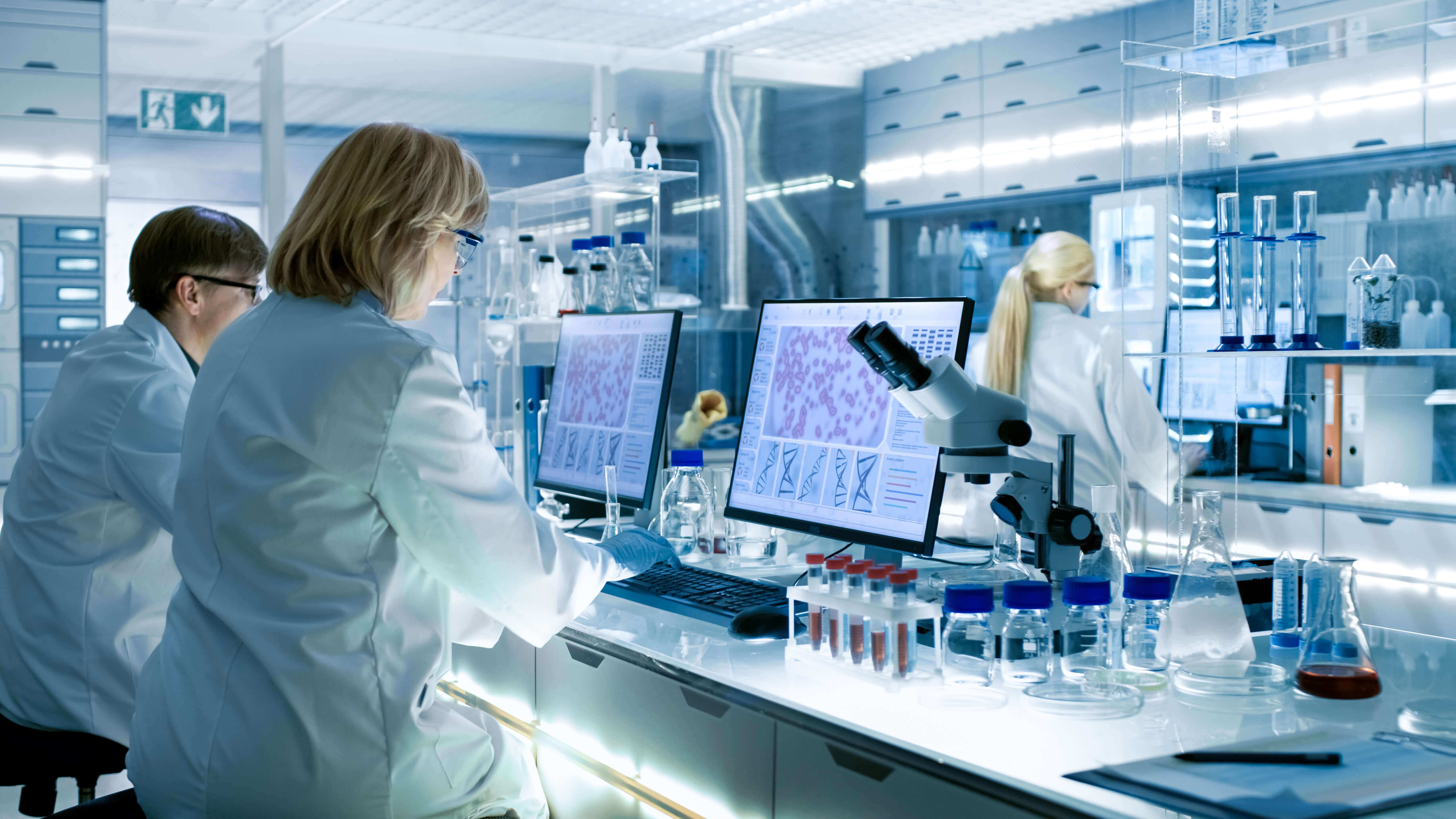 Scientists In Lab On Computers