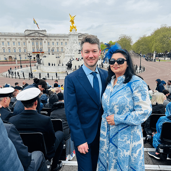 Caption: Healthcare professional volunteer, Zaki and his wife, Ghaniah at the Coronation